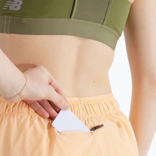 Women's shorts New Balance RC Seamless 3" peach blossom