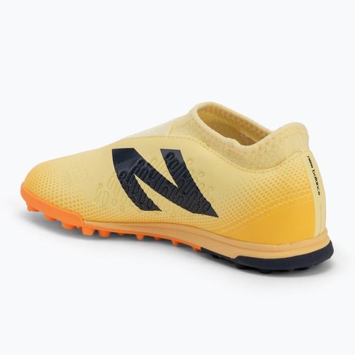 Children's football boots New Balance Tekela Magique V4+ Jr TF beige