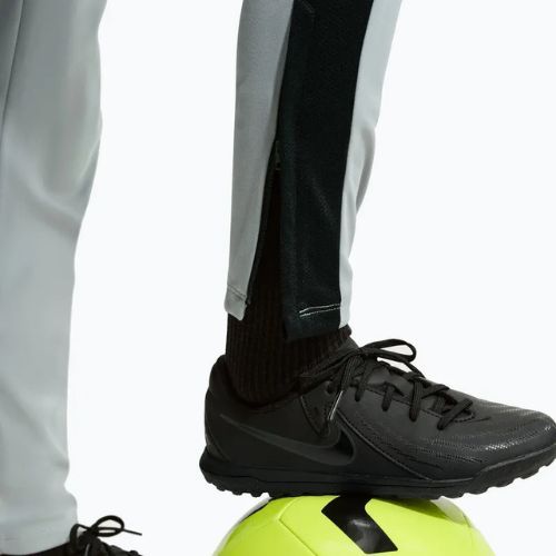 Children's trousers Nike Academy Dri-Fit Jr light smoke grey/white/black/metallic gold