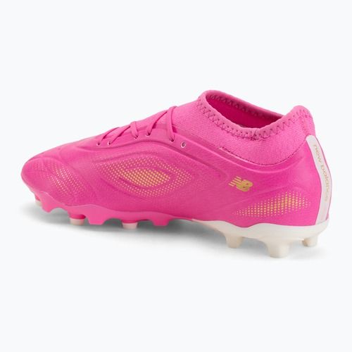 Children's football boots New Balance Tekela Team V5 pink heat/metallic gold/pink satin