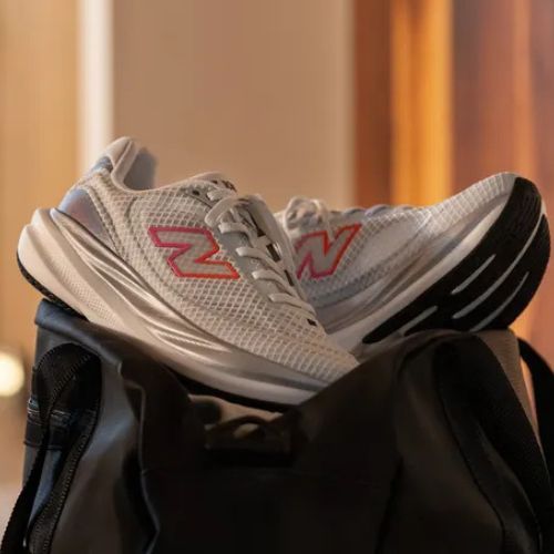 Women's running shoes New Balance 1080's V15 103 white/pink heat/tangerine heat