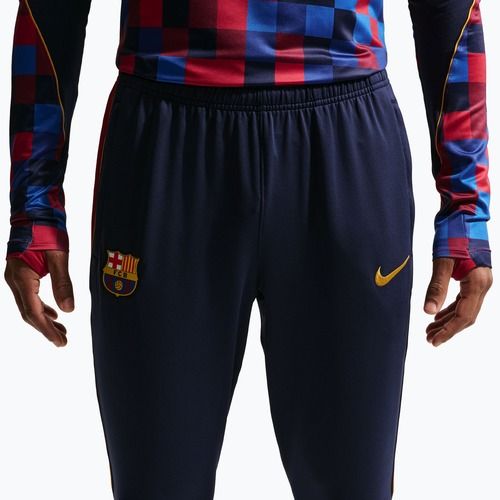 Men's football trousers Nike FC Barcelona Strike Dri-Fit blackened blue/noble red/yellow