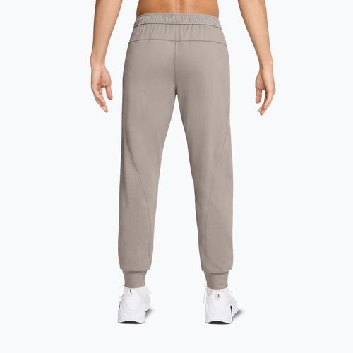 Men's trousers Nike Primary NanoKnit moon particle/college grey/moon particle