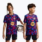 Children's football shirt Nike FC Barcelona Dri-Fit Pre-Match noble red/mineral yellow