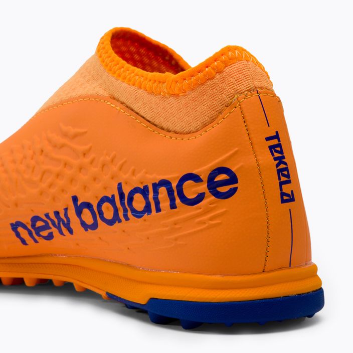 New Balance Tekela V3+ Magique TF children's football boots orange JST3TD35.M.055 8