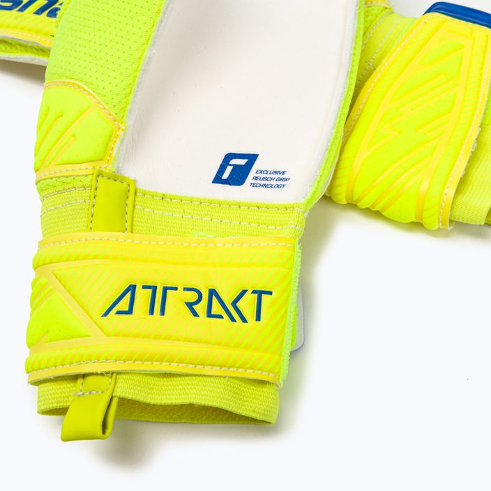 Reusch Attrakt Grip children's goalkeeping gloves yellow 5272815 4