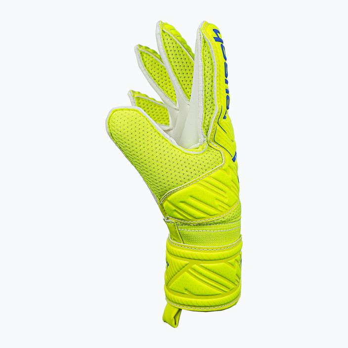 Reusch Attrakt Grip children's goalkeeping gloves yellow 5272815 7