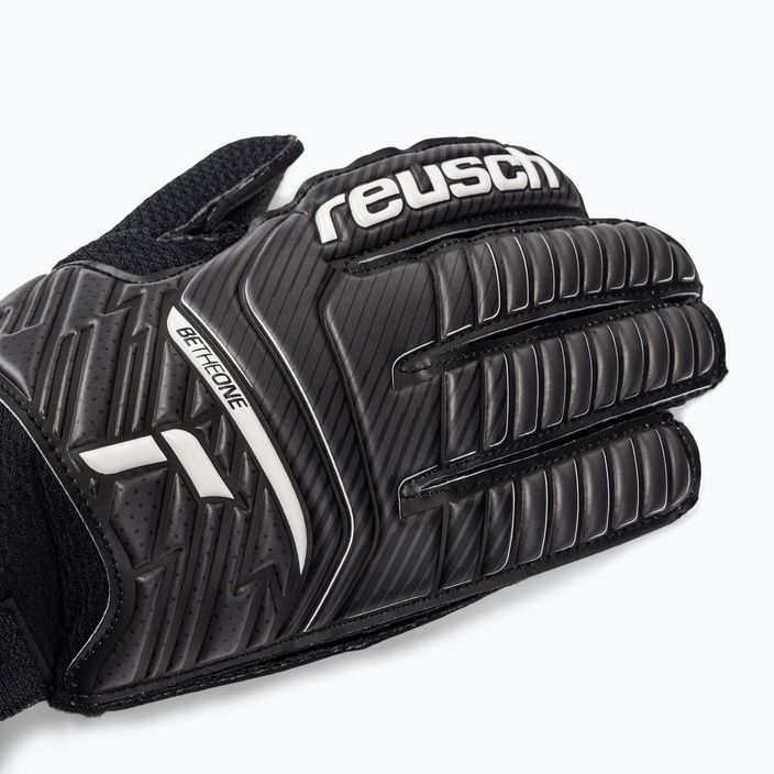 Reusch Attrakt Resist Junior children's goalkeeping gloves black 5272615-7700 3