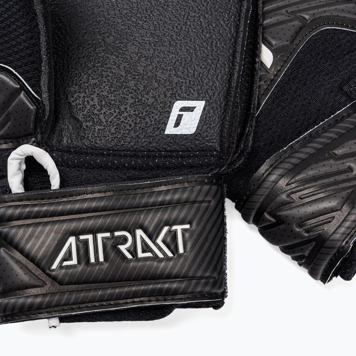 Reusch Attrakt Resist Junior children's goalkeeping gloves black 5272615-7700 4