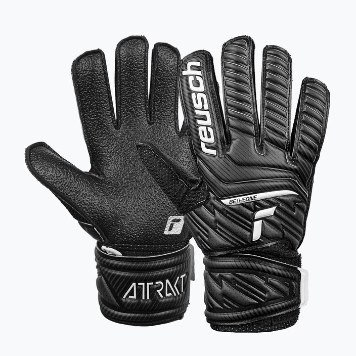 Reusch Attrakt Resist Junior children's goalkeeping gloves black 5272615-7700 5