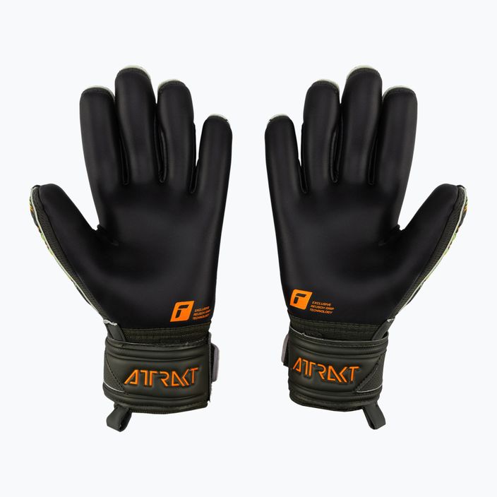 Reusch Attrakt Gold X Junior goalkeeper's gloves green-black 5372055-5555 2