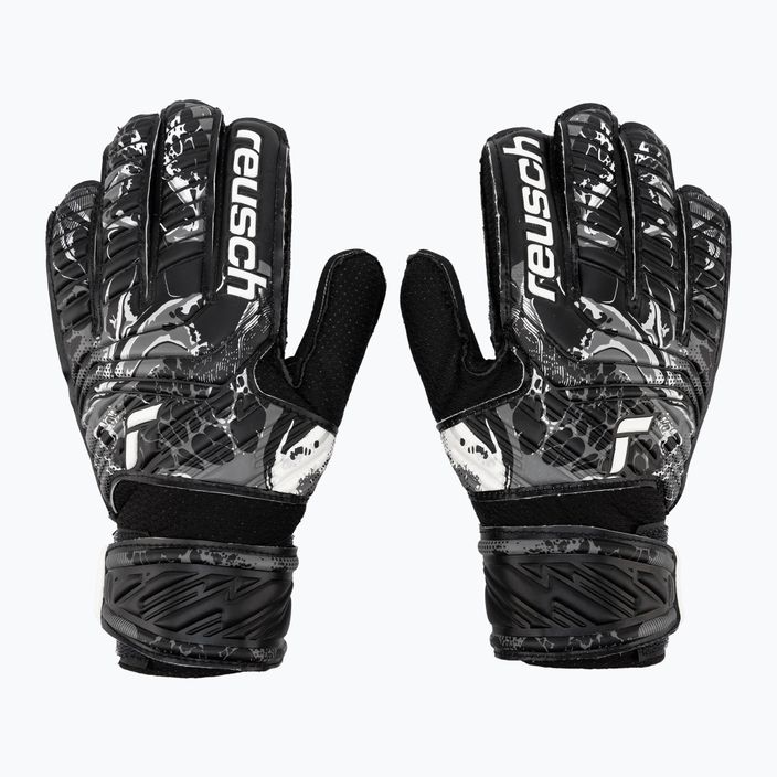 Reusch Attrakt Resist Junior children's goalkeeper gloves black 5372615-7700