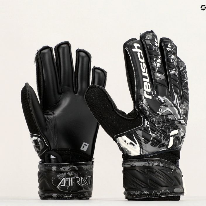 Reusch Attrakt Solid Junior children's goalkeeping gloves black 5372515-7700 9