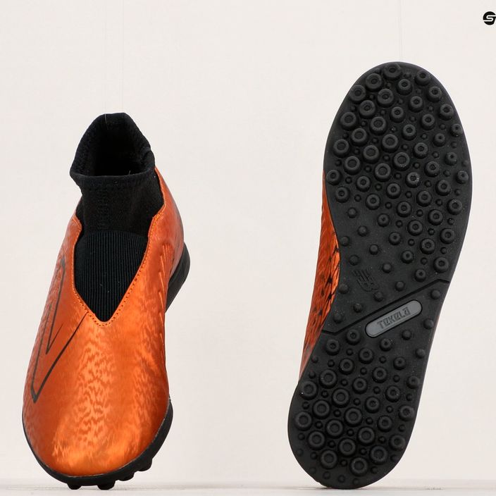 New Balance Tekela V4 Magique TF copper children's football boots 12