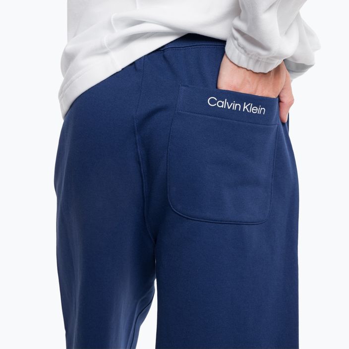 Men's Calvin Klein 7" Knit 6FZ blue depths training shorts 4