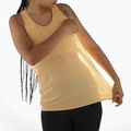 Women's running tank top Salomon SHAKEout Air Tank warm apricot 3