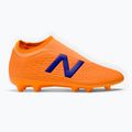 Children's football boots New Balance Tekela V3+ Magique FG orange JST3FD35.M.045 2