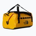 Travel bag The North Face Base Camp Waterproof Duffel 50 l summit gold/tnf black