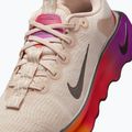 Women's training shoes Nike Motiva SE pearl white/pale ivory/vivid purple/metallic gold grain 8