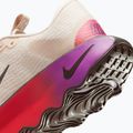 Women's training shoes Nike Motiva SE pearl white/pale ivory/vivid purple/metallic gold grain 9