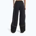 Women's trousers Under Armour Unstoppable Woven Wind ultimate black/anthracite/anthracite 3