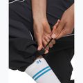 Women's trousers Under Armour Unstoppable Woven Wind ultimate black/anthracite/anthracite 4