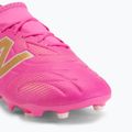 Children's football boots New Balance Tekela Team V5 pink heat/metallic gold/pink satin 7