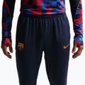 Men's football trousers Nike FC Barcelona Strike Dri-Fit blackened blue/noble red/yellow 6