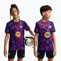 Children's football shirt Nike FC Barcelona Dri-Fit Pre-Match noble red/mineral yellow
