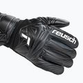 Children's goalkeeper gloves Reusch Attrakt Resist 5672615 black 5
