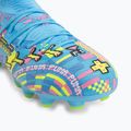 Children's football boots PUMA Future 9 Match Advanced Level FG/AG Jr puma white/blue glimmer/pink glimmer/yellow alert 7