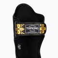 Top King Kanok black tibia and foot protectors 7