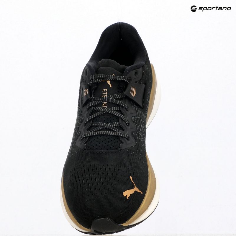 Women's running shoes Puma Eternity Nitro black/gold/white 9