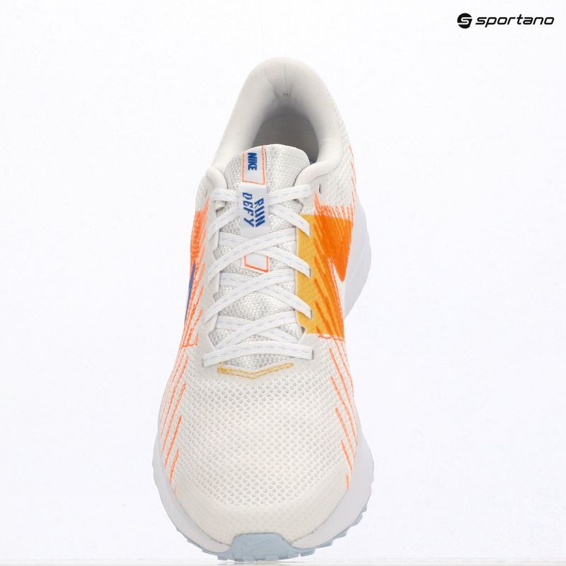 Men's running shoes Nike Run Defy white/topaz gold/blue crystal 6