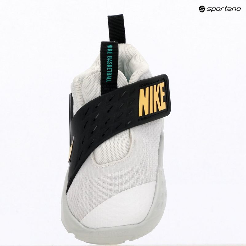 Children's shoes Nike Team Hustle D 12 white/black/clear emerald/topaz gold 6