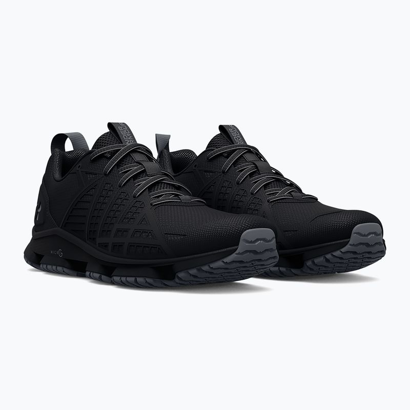 Under Armour MG Strikefast women's shoes black/black/pitch gray 10