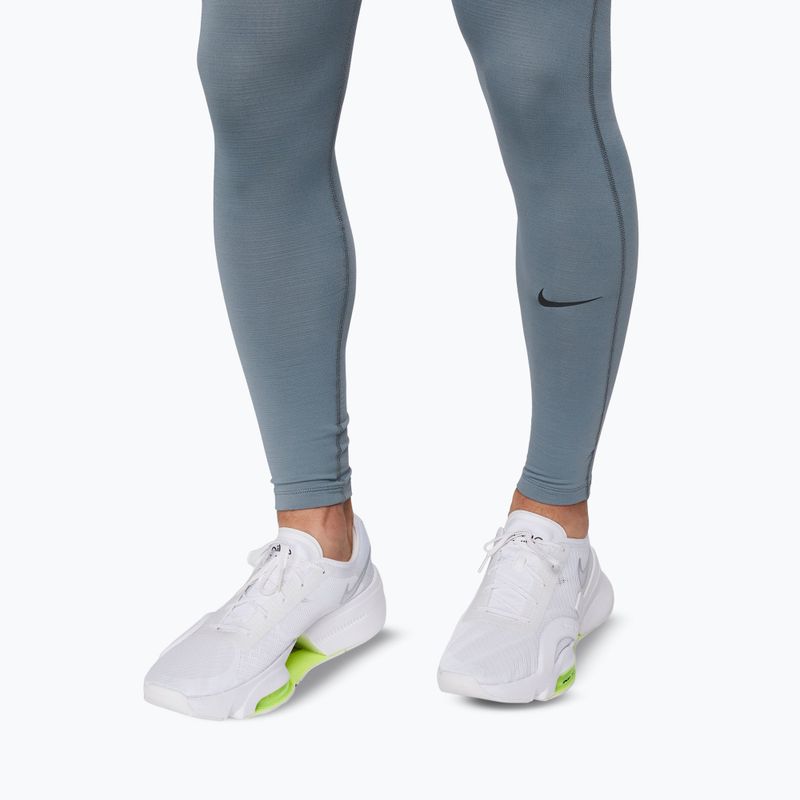 Men's leggings Nike Pro Warm smoke grey/black 6