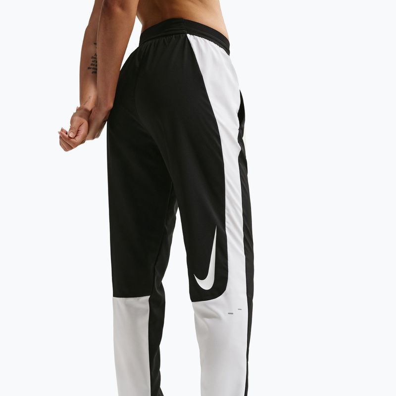 Women's running trousers Nike Tempo Swoosh Dri-Fit Mid-Rise 7/8 black/white 4