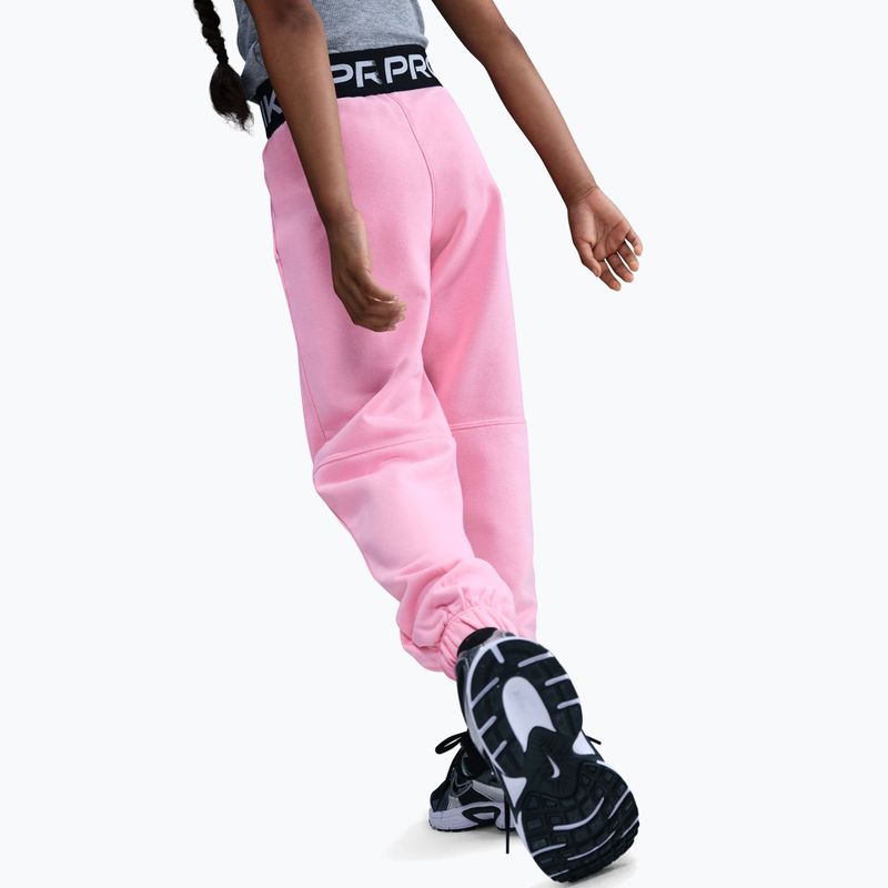 Children's trousers Nike Pro Fleece Dri-Fit med soft pink/med soft pink/black/white 6