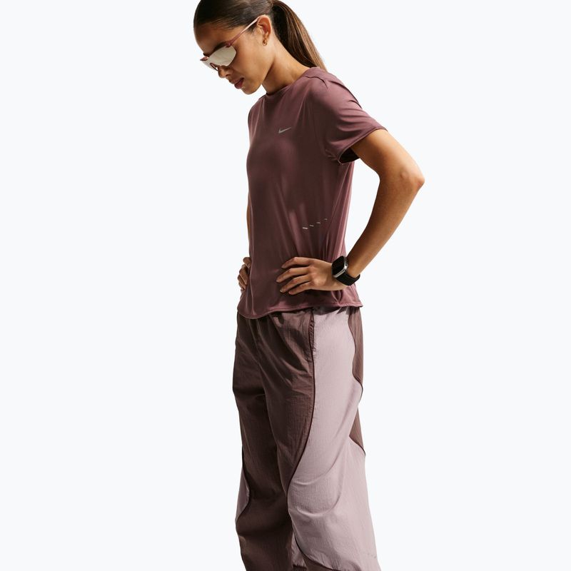 Women's running trousers Nike Swift UV Repel Mid-Rise tattoo/light violet ore 6