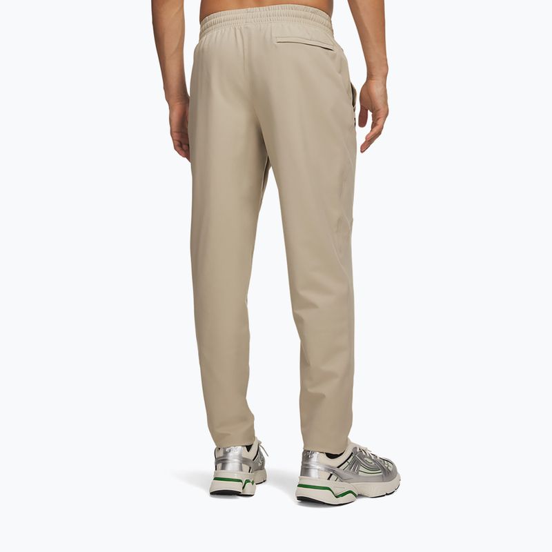 Men's training trousers Under Armour Unstoppable Tapered Pants city khaki/black 3