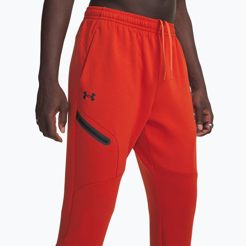 Men's training trousers Under Armour Unstoppable Fleece Jgr surplus orange black 4