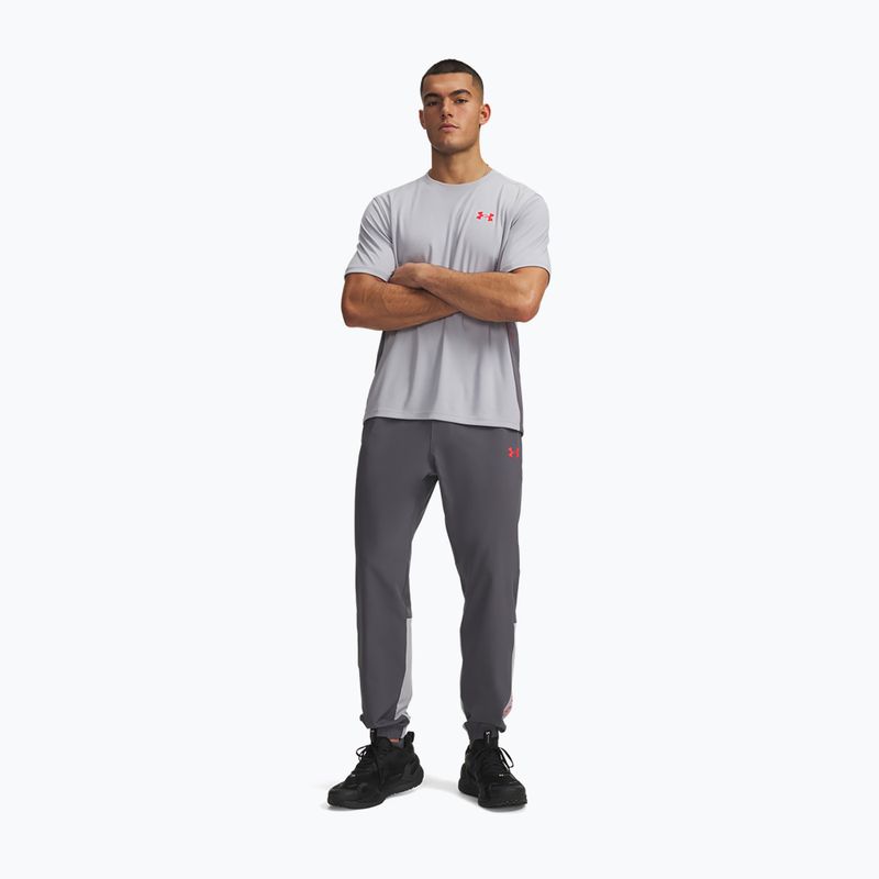 Men's training trousers Under Armour Tech Utility Woven Pants castlerock/mod gray/racer red 2