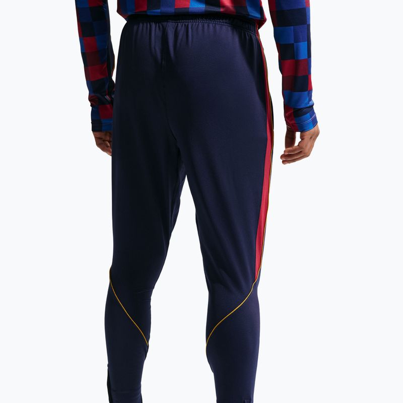Men's football trousers Nike FC Barcelona Strike Dri-Fit blackened blue/noble red/yellow 5