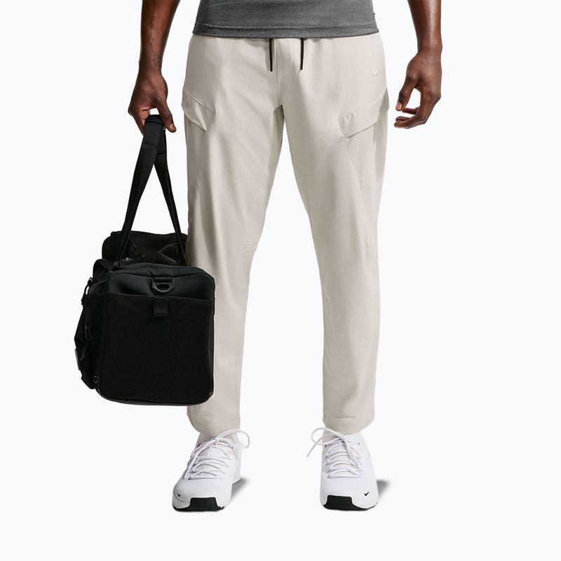 Men's trousers Nike Unlimited ight orewood brown/black/light orewood brown 7