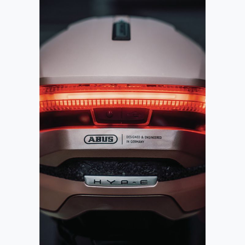 Bike helmet with indicators ABUS Hyp-E champagne gold 9