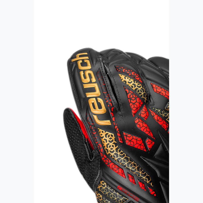 Reusch Attrakt Solid goalkeeper gloves black/gold/fiery red 5