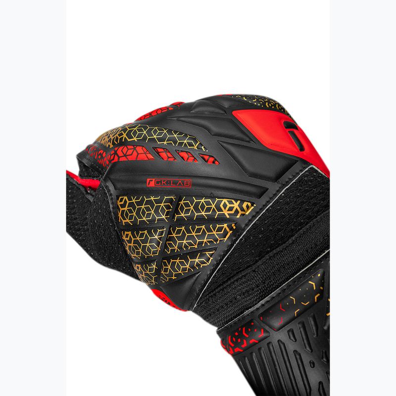Reusch Attrakt Solid goalkeeper gloves black/gold/fiery red 6