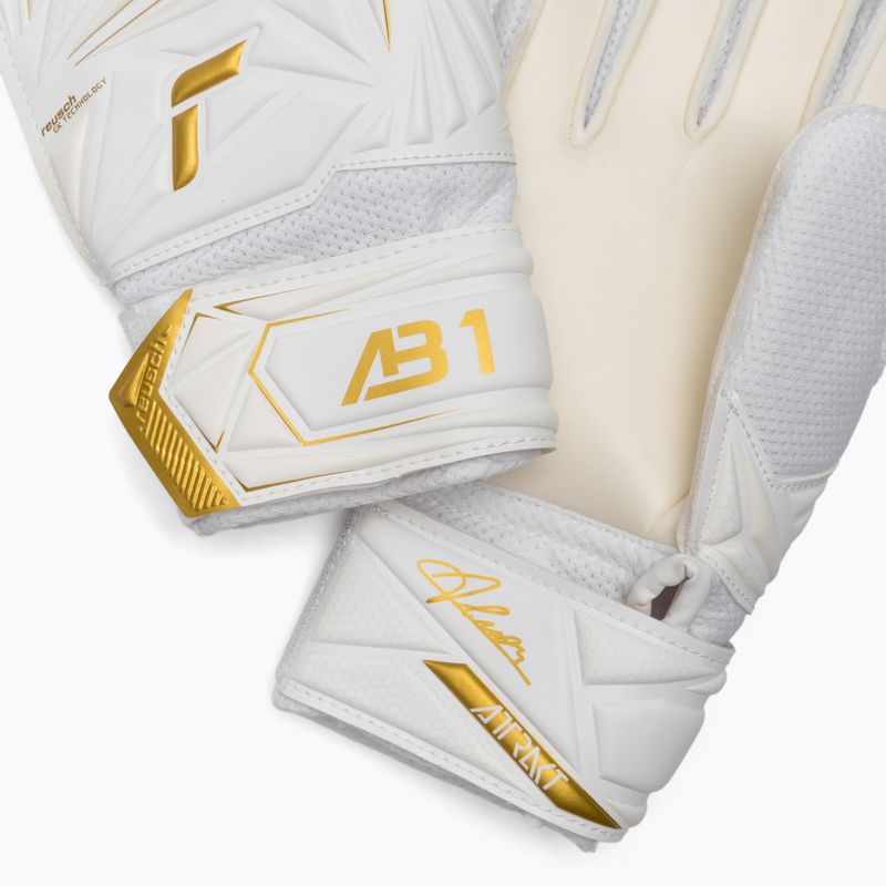 Children's goalkeeper gloves Reusch Attrakt AB1 Solid Junior white/gold 5