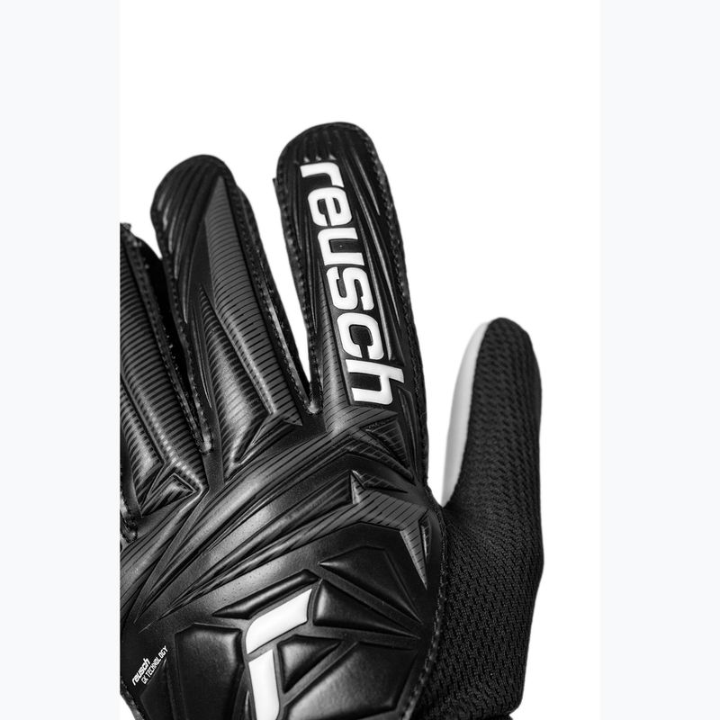 Children's goalkeeper gloves Reusch Attrakt Starter Solid Junior 5672514 black 5